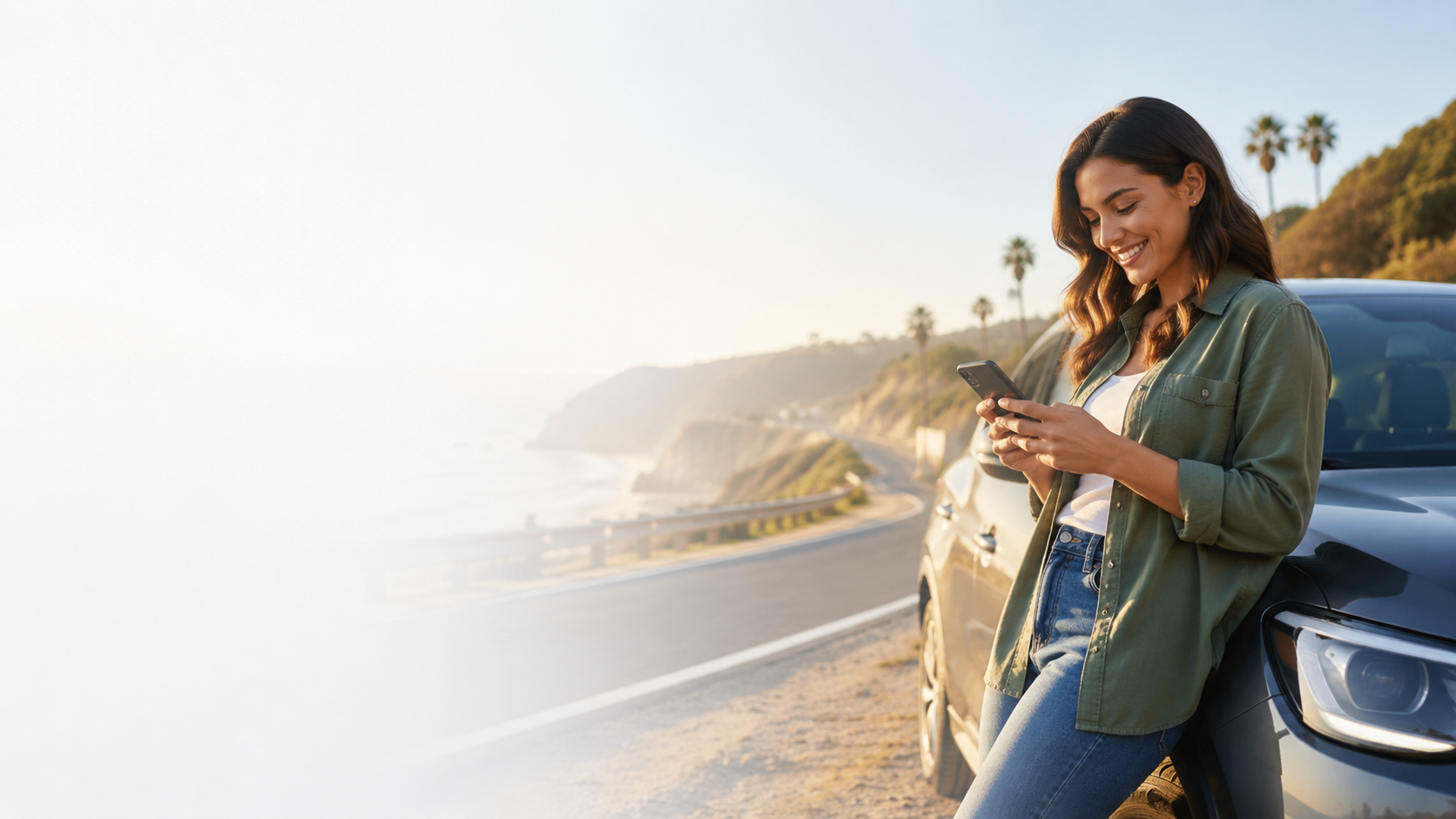 A driver above the California coast finishing her traffic school course on her phone